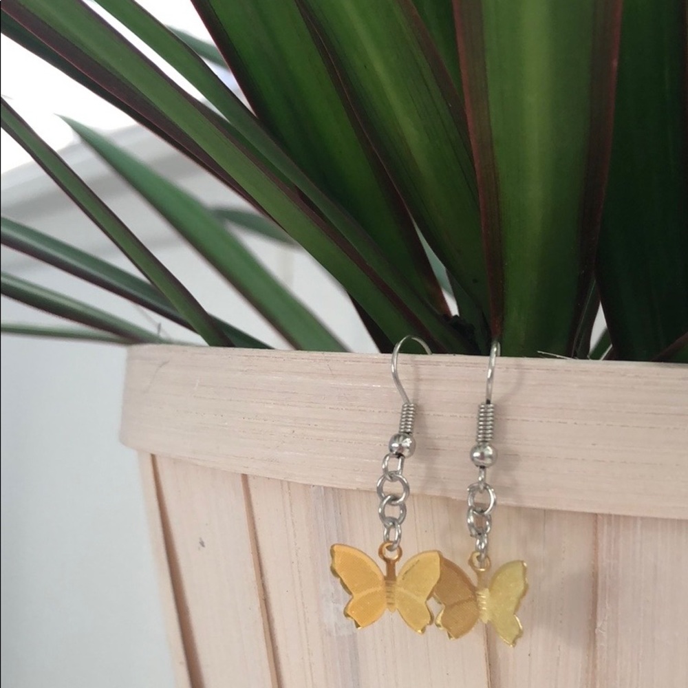 gold butterfly earrings! 🦋